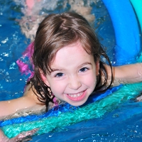 A child in a swimming lesson