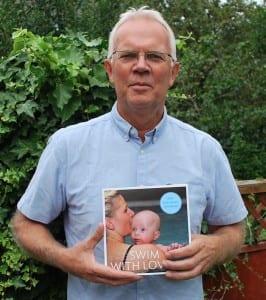 Terje Stakset in London with his book on baby swimming, Swim with Lonve