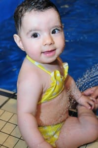 Baby swimmer with Blue Wave Swim
