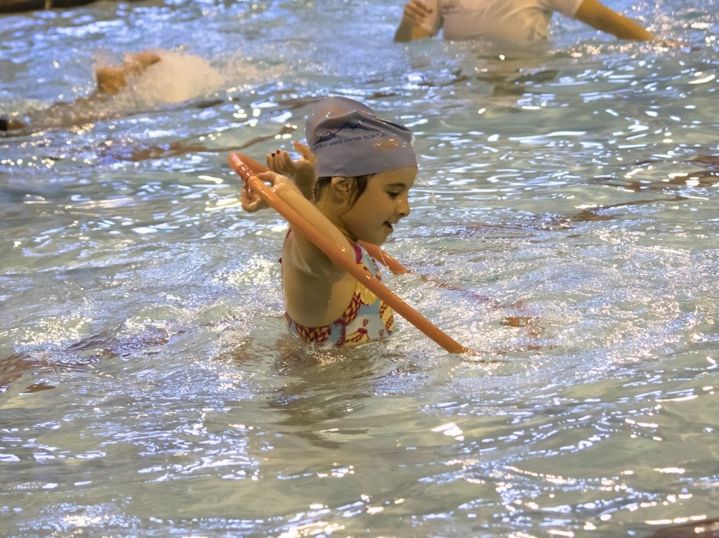 Playful games in water to build water confidence