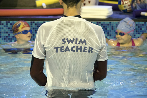 Swimming teacher at Blue Wave Swim School in London, U.K